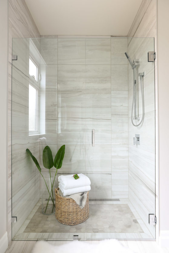 Zero curb shower, walk in shower fully tiled in accessible bathroom designed by Hollie Whitehead