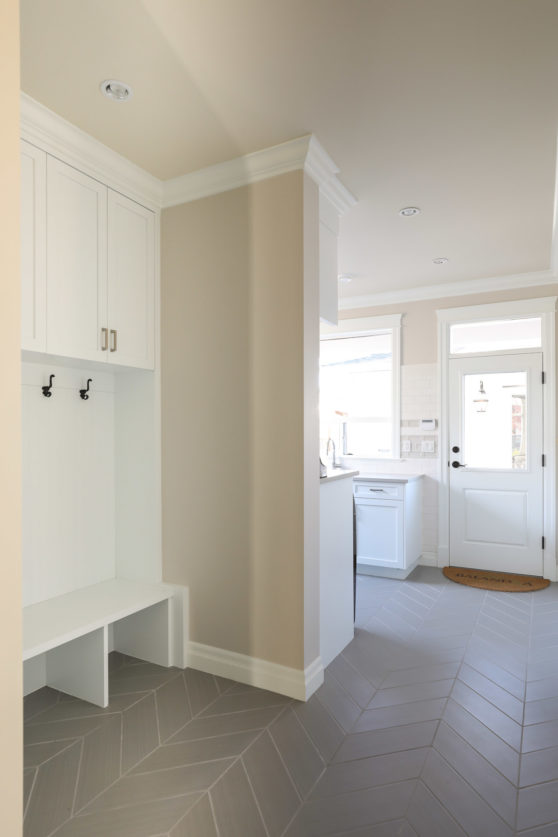 Laundry room and mudroom in home designed by Hollie Whitehead.